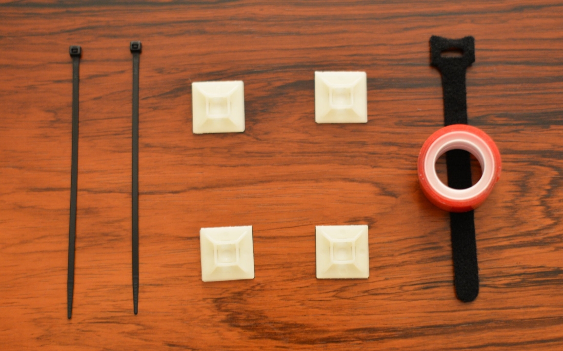 Cable management materials including zip ties, zip tie mounts, and velcro strips